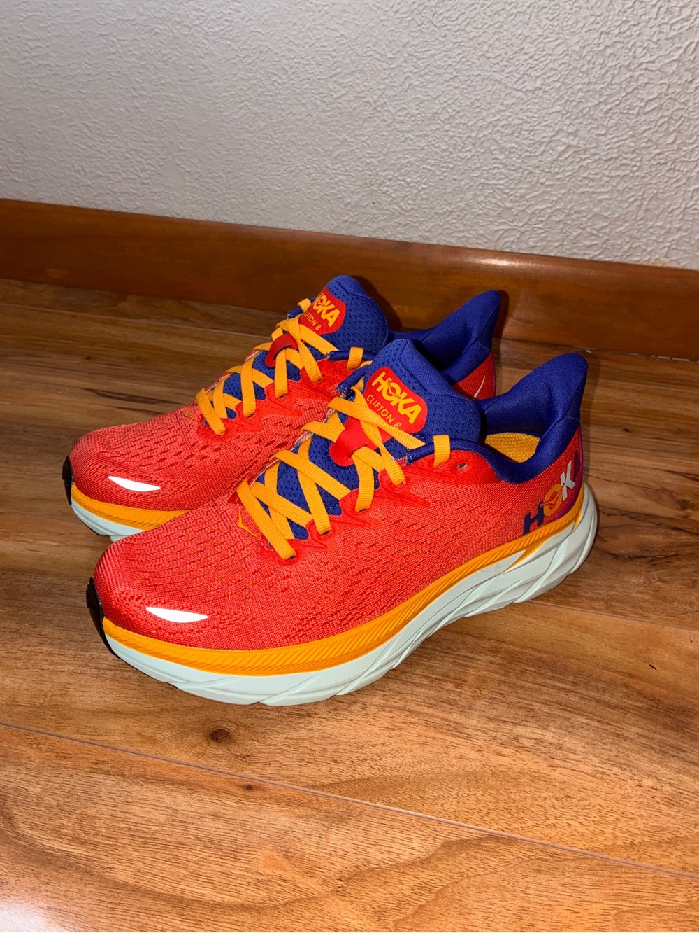 Hoka Women’s Clifton 8 Athletic Running Sneaker Shoes, fiesta/bluing- size 5